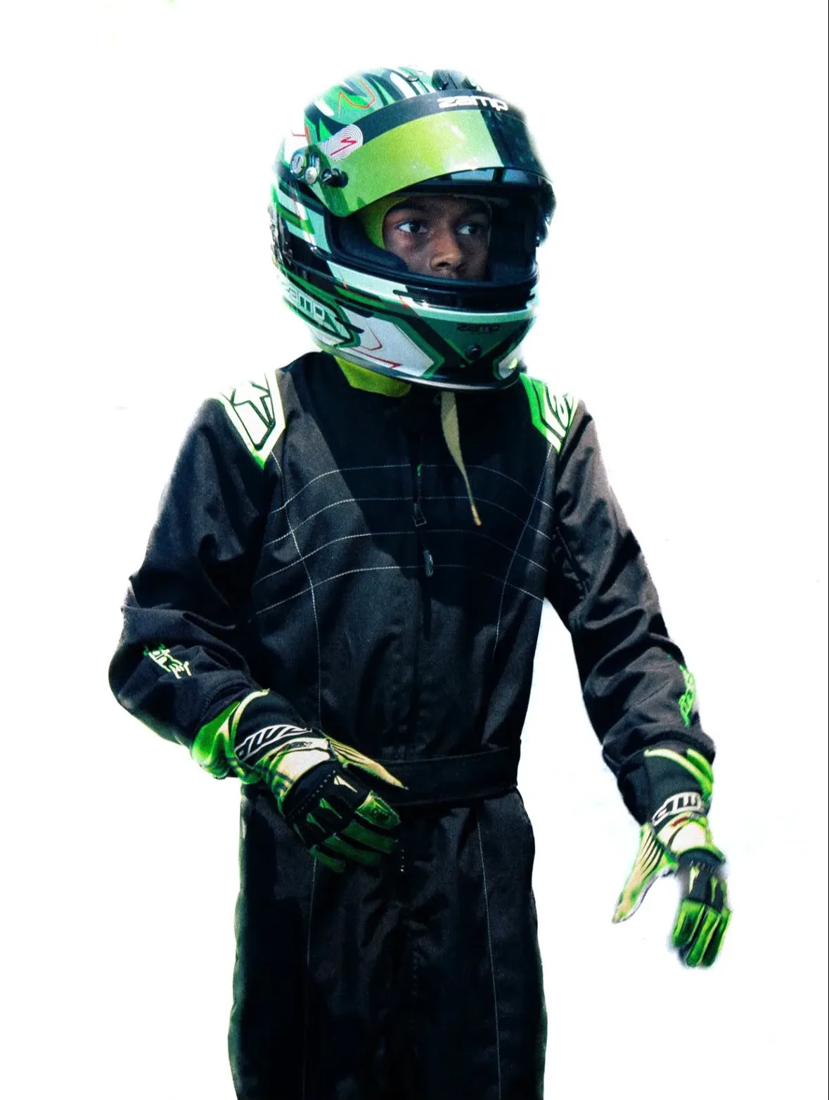 Vidyuth in his race suit and green helmet